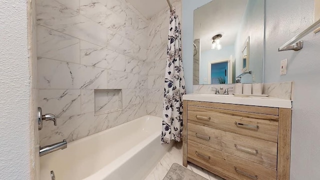 bathroom featuring tile patterned flooring, shower / bath combination with curtain, and vanity