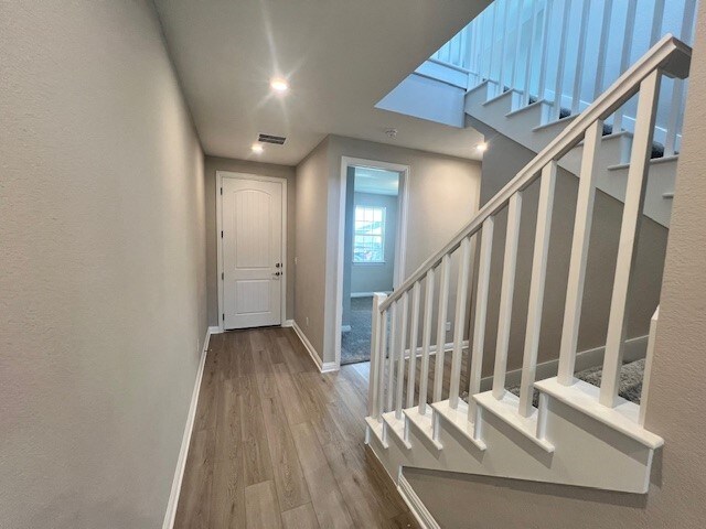 foyer featuring hardwood / wood-style flooring