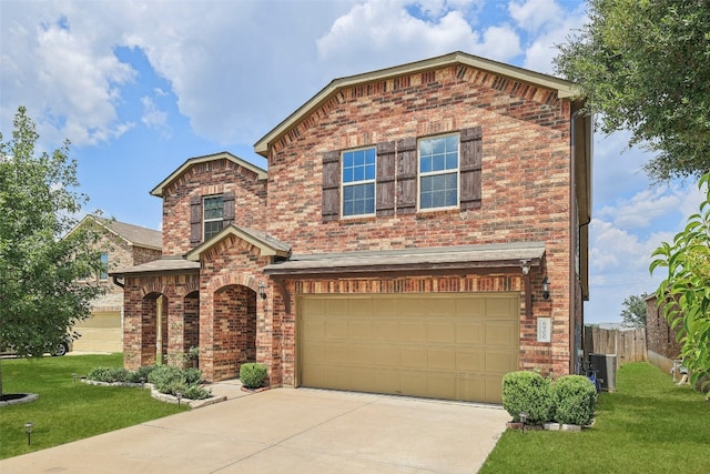 view of front facade featuring a front lawn, central AC, and a garage