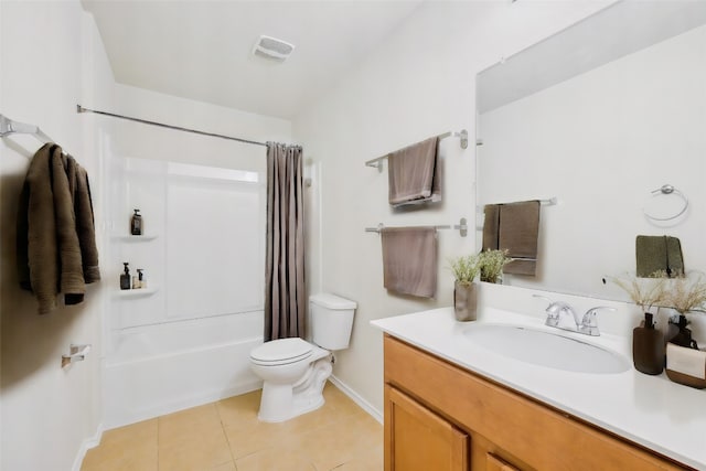 full bathroom featuring shower / tub combo with curtain, vanity, tile patterned flooring, and toilet