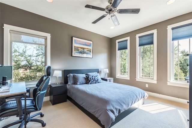 bedroom featuring ceiling fan and carpet flooring