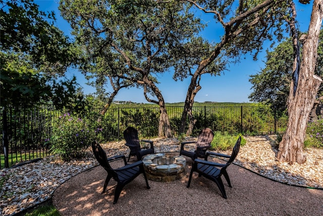 view of patio / terrace with a fire pit