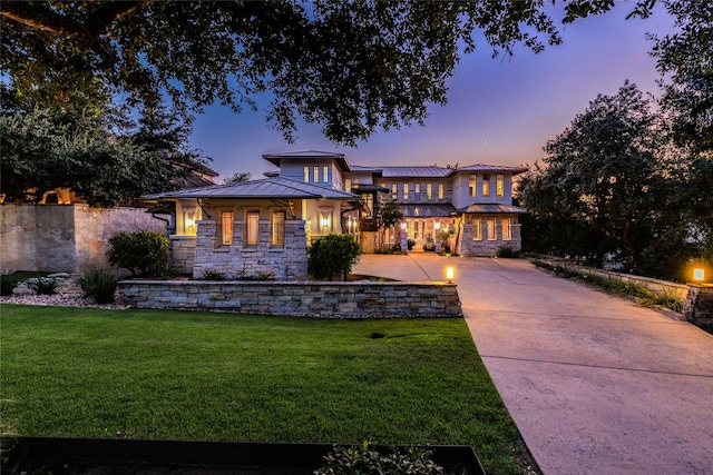 view of front of home featuring a yard