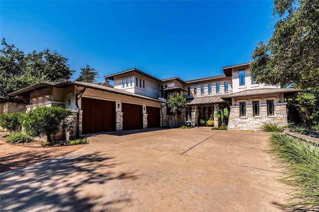 prairie-style house with a garage