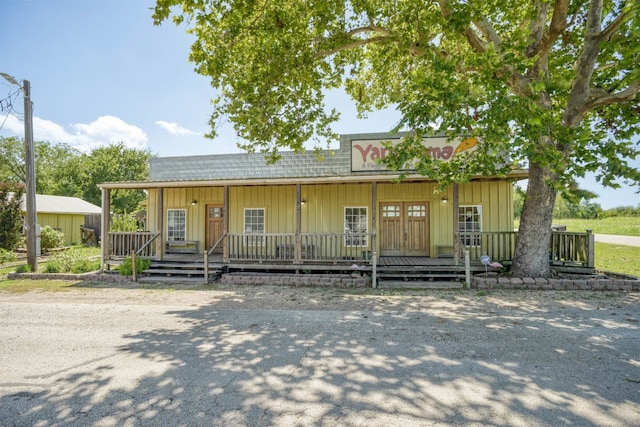 view of front of house with covered porch