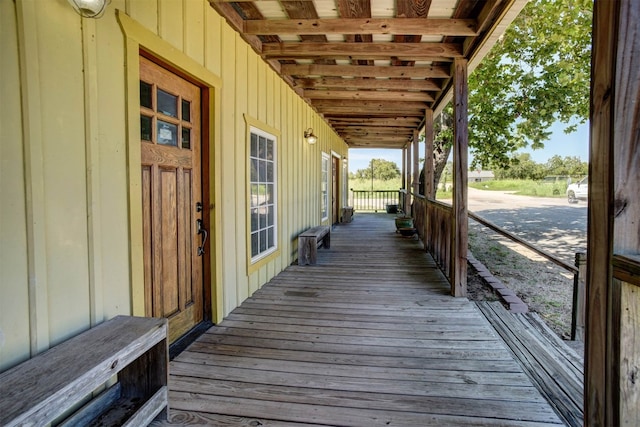 deck with covered porch