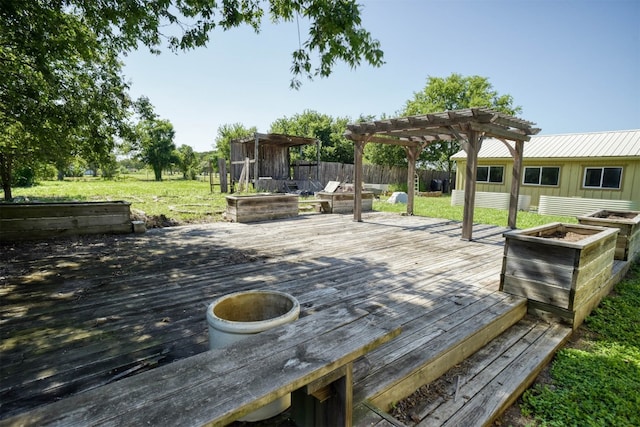 wooden deck with a pergola and a yard