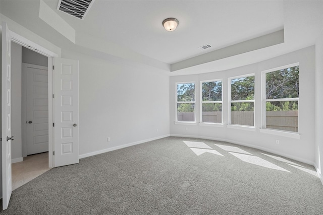 empty room featuring carpet flooring