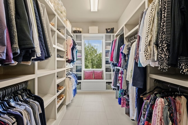 walk in closet featuring light tile patterned floors