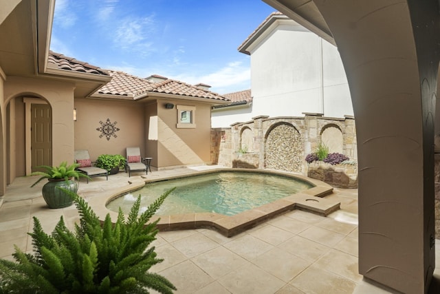 view of pool with a patio area