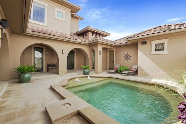 back of house featuring a patio area