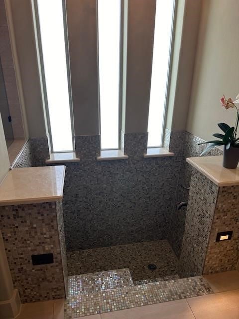 bathroom with tile patterned floors