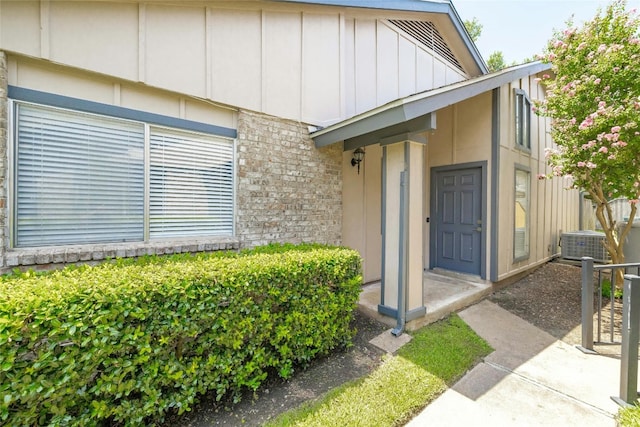 view of exterior entry featuring cooling unit