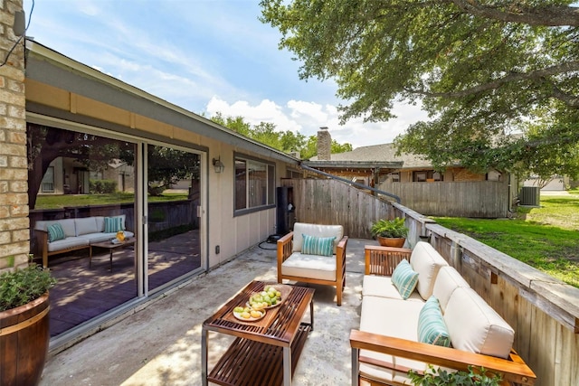 view of patio / terrace with outdoor lounge area and central AC unit