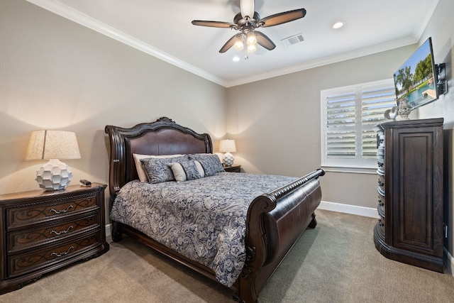 carpeted bedroom featuring crown molding and ceiling fan