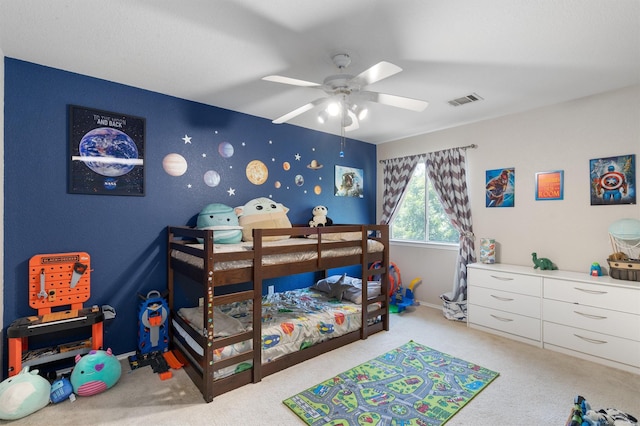 bedroom featuring ceiling fan and carpet flooring