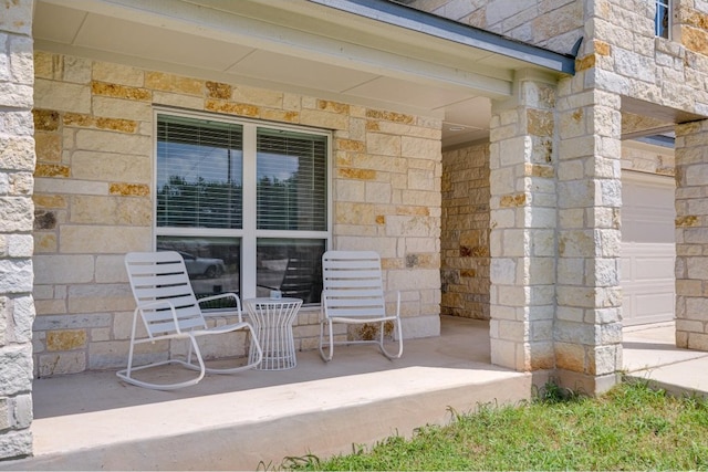 property entrance with a garage