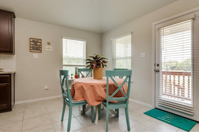 dining room with light tile patterned floors