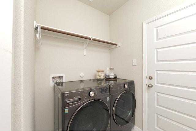 laundry room featuring washer and dryer