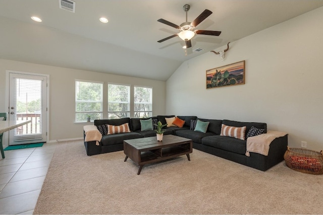 tiled living room with vaulted ceiling and ceiling fan