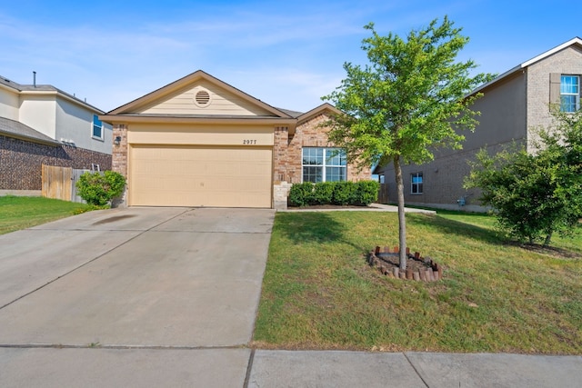 ranch-style house with a garage and a front yard