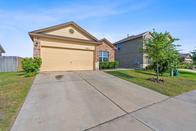 single story home featuring a garage and a front yard