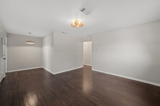 empty room with wood-type flooring