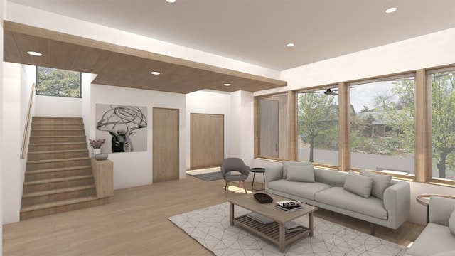 living room with plenty of natural light and light wood-type flooring