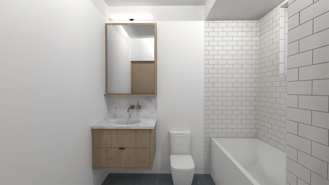 bathroom featuring tile patterned flooring, toilet, and vanity