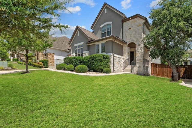 view of front of home with a front yard