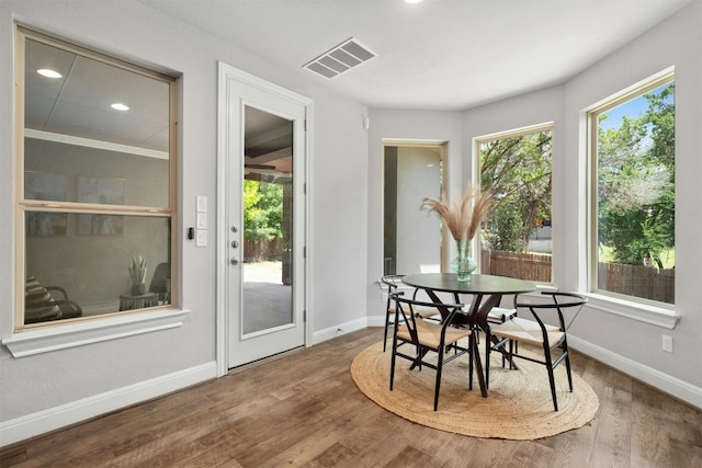 dining room with hardwood / wood-style floors