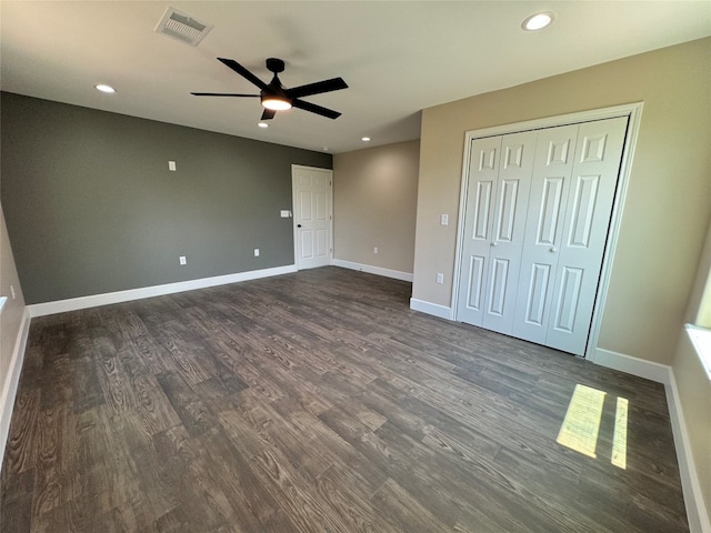 unfurnished bedroom with a closet, ceiling fan, and hardwood / wood-style floors