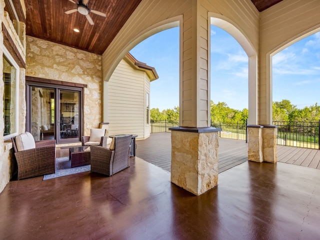 view of patio with ceiling fan