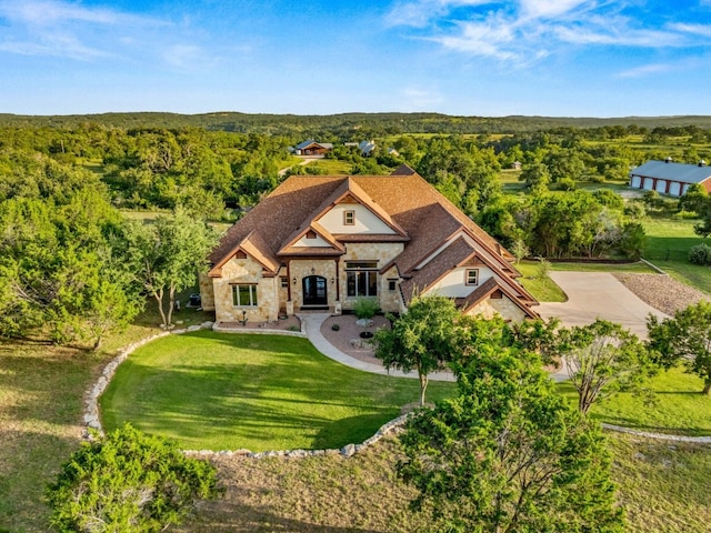 aerial view with a wooded view