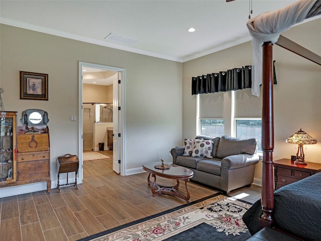 living room featuring ornamental molding and hardwood / wood-style floors