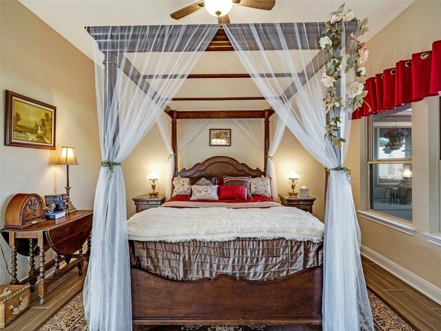 bedroom with ceiling fan and hardwood / wood-style flooring