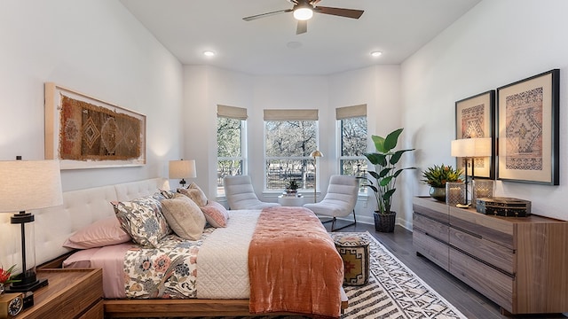 bedroom featuring ceiling fan and wood-type flooring