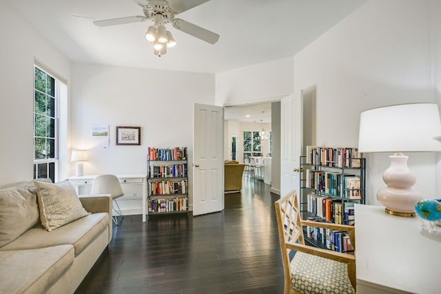 sitting room with ceiling fan, dark hardwood / wood-style flooring, and a wealth of natural light