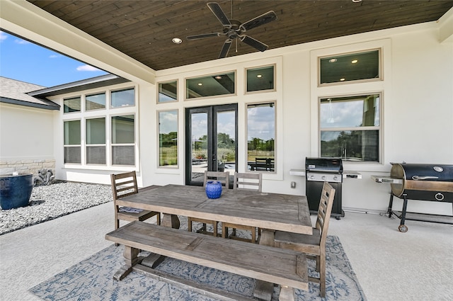 view of patio / terrace with ceiling fan and grilling area