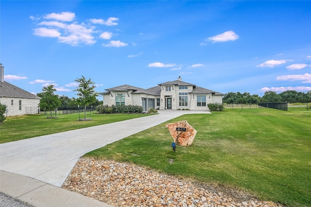 ranch-style home with a front yard