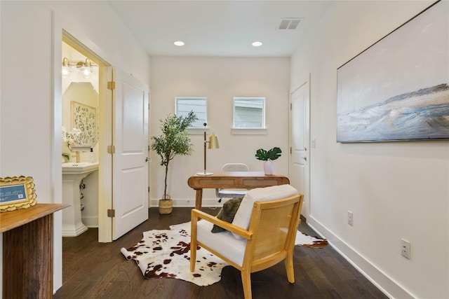 living area with dark wood-type flooring