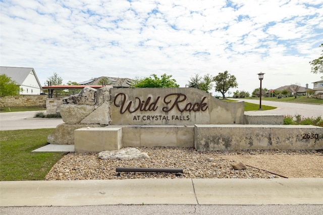 view of community sign