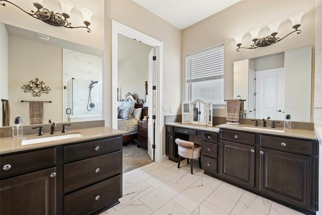 bathroom with tile patterned floors, vanity, and a shower