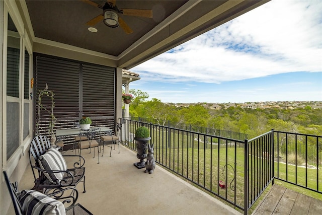 balcony featuring ceiling fan