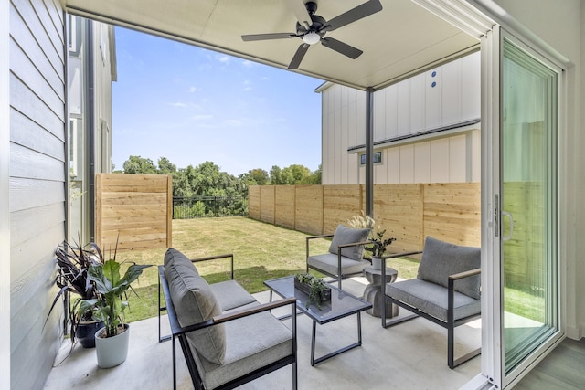 view of patio with ceiling fan and outdoor lounge area