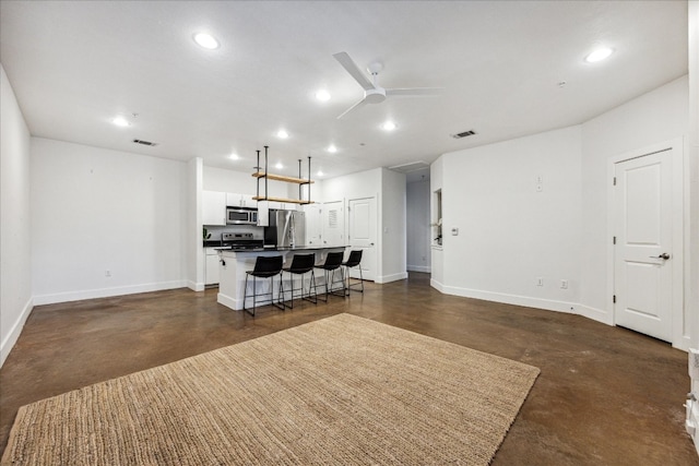 living room featuring ceiling fan