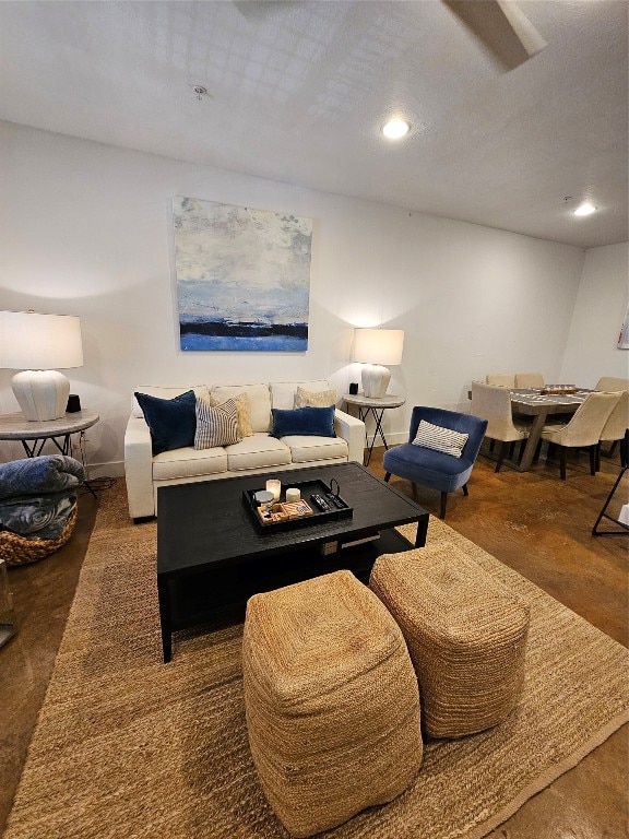 living room with a textured ceiling