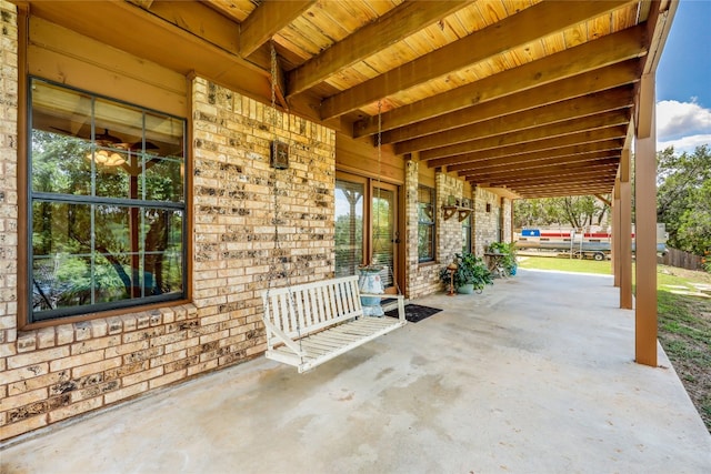 view of patio featuring a porch