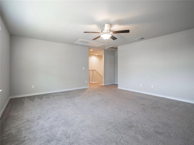 245 Tulum Ter, Leander, TX 78641 - carpeted empty room featuring attic access and ceiling fan