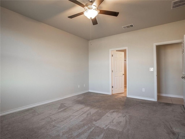 245 Tulum Ter, Leander, TX 78641 - carpeted spare room featuring a ceiling fan and baseboards